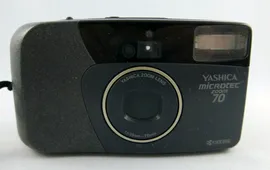 Yashica Microtec Zoom 70 дата работает с недостатком